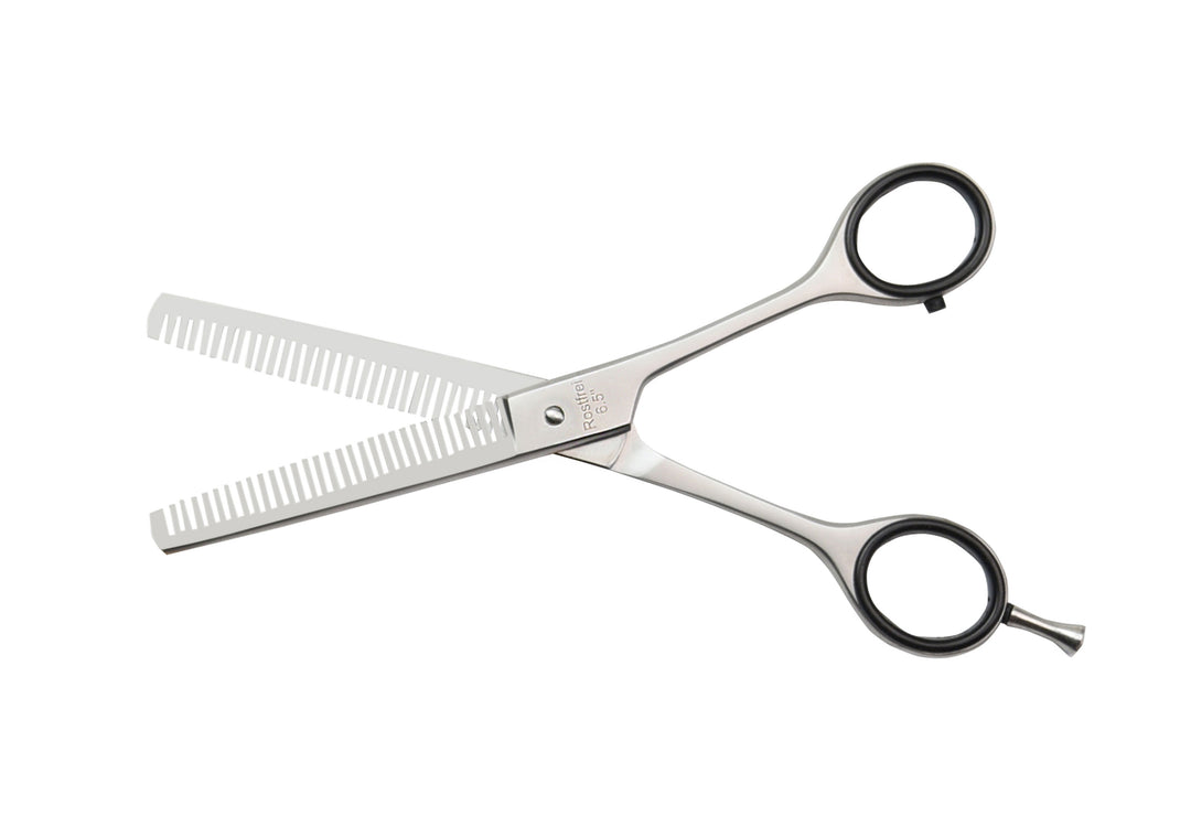 Hair scissors with double-sided teeth
